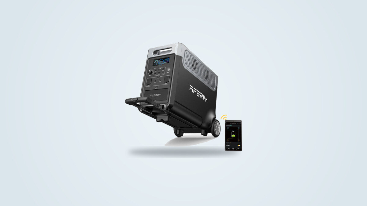 Aferiy P310 portable power station at a three-quarter angle, LCD screen lit, wheels and telescopic handle visible