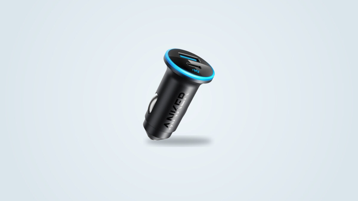 Anker 323 car charger seen at three-quarter angle, USB-C and USB-A ports and blue light ring visible