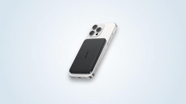 Anker Nano A1665 power bank attached to the back of an iPhone by MagSafe magnet