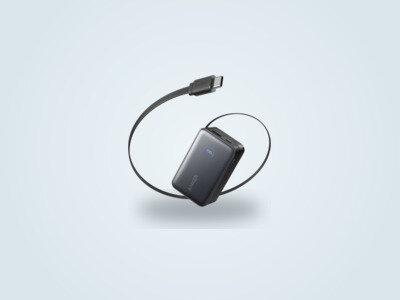 Anker Nano InstaCord 45W power bank with its retractable USB-C cable partly extended and its display lit up
