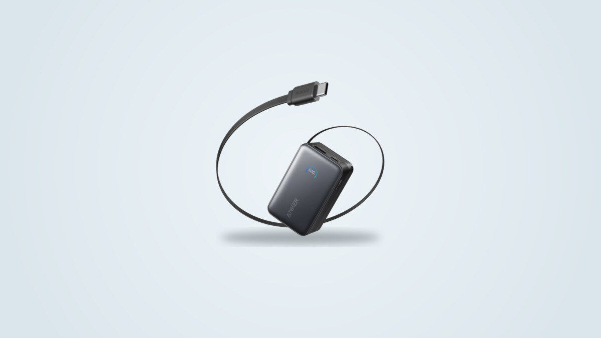 Anker Nano InstaCord 45W power bank with its retractable USB-C cable partly extended and its display lit up