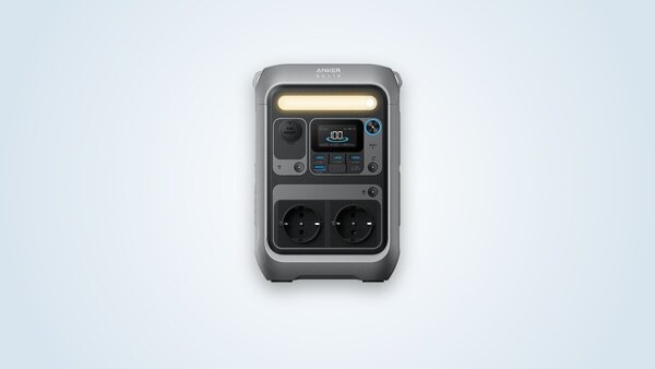 Anker Solix C300 portable power station at three-quarter angle, screen lit, 230 V sockets and USB-C ports visible