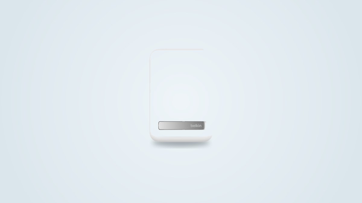 Belkin BoostCharge Pro 10K magnetic power bank attached to the back of an iPhone, kickstand extended