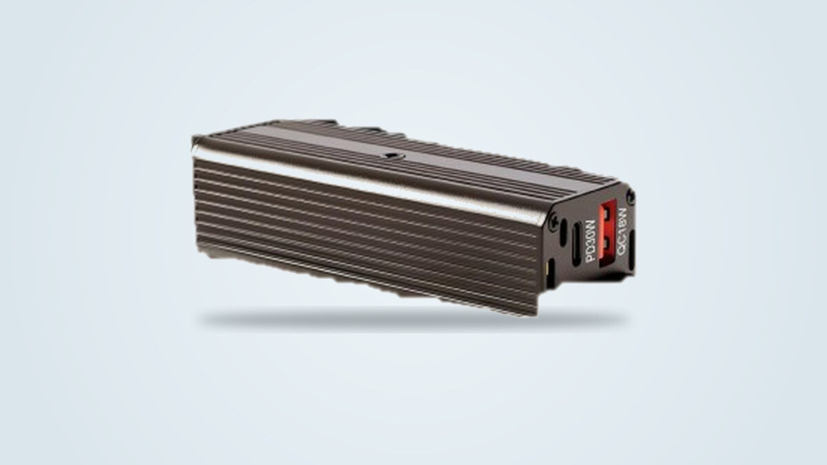 Bestek 200W power inverter with a ribbed metal housing, viewed at a three-quarter angle on a light background