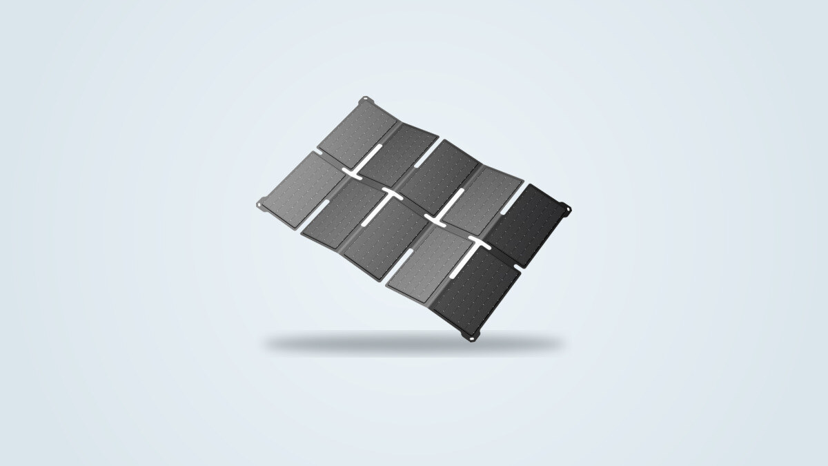 Foldable BigBlue P35 solar panel unfolded at an angle on a light background, its cell segments and corner grommets visible