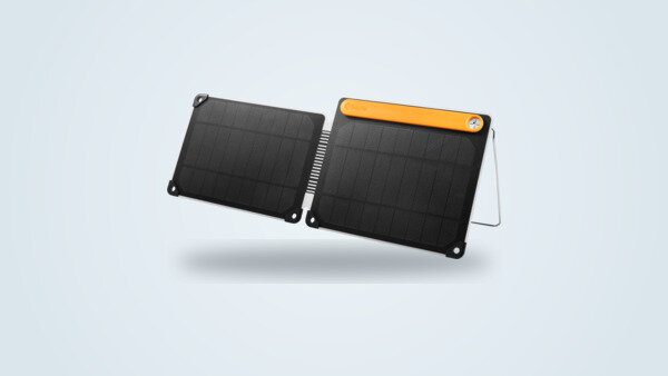 Folding BioLite SolarPanel 10+ solar panel open on its metal kickstand, with sundial and BioLite logo visible