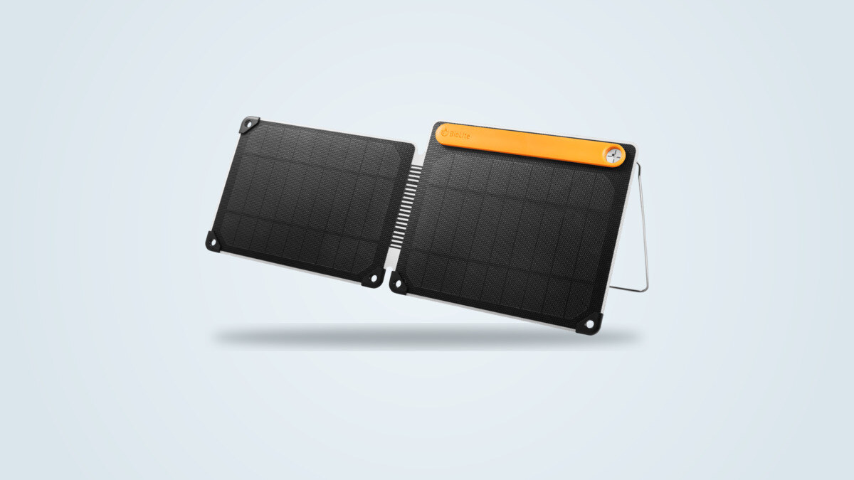Folding BioLite SolarPanel 10+ solar panel open on its metal kickstand, with sundial and BioLite logo visible