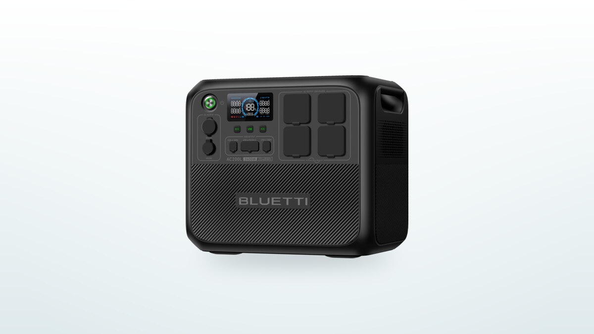 Bluetti AC200L portable power station at three-quarter angle, screen lit showing the charge percentage