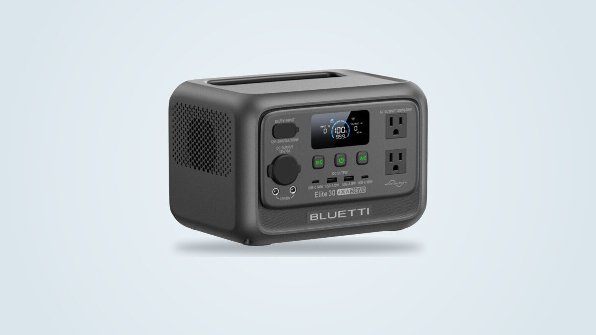 Bluetti Elite 30 V2 portable power station shown at an angle, LCD screen lit, built-in handle visible