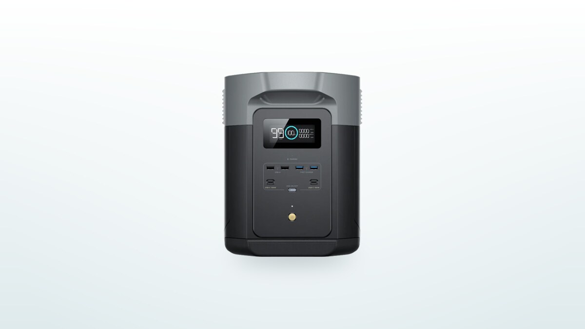 EcoFlow Delta 2 Max power station sitting on the floor, LCD screen showing the charge level
