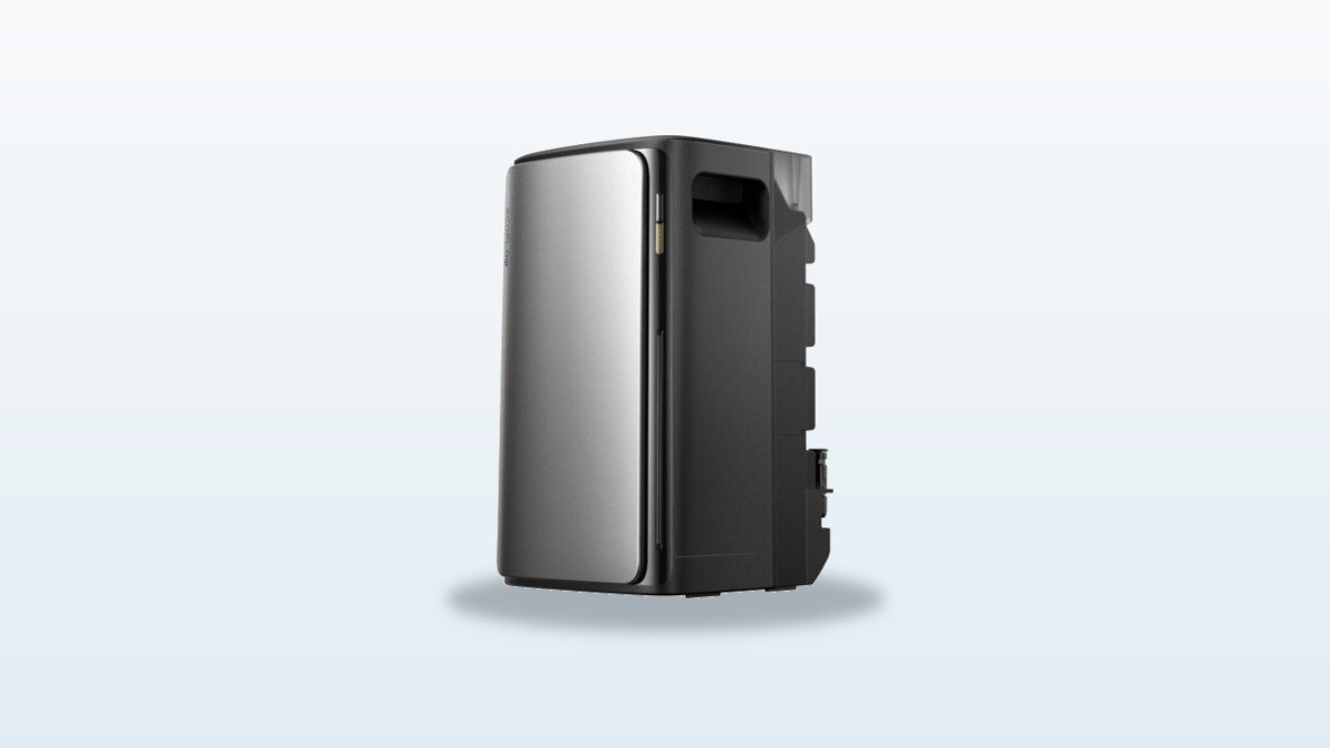 EcoFlow Stream Ultra hybrid solar battery placed on the ground, with a solar panel connected in the background