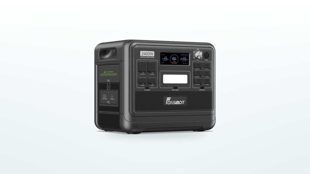 Fossibot F2400 portable power station at three-quarter angle, screen lit, input control dial and port panel visible
