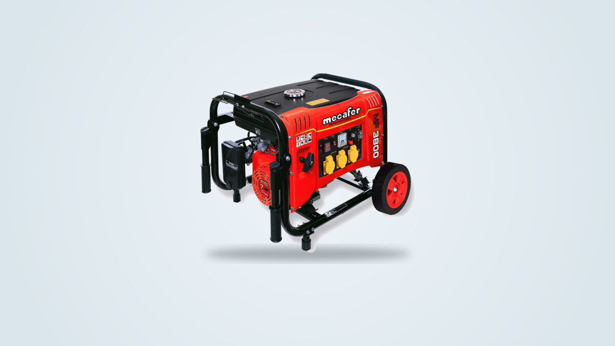 Mecafer MF3800 red and black petrol generator, tubular wheeled frame, seen from a three-quarter angle, handles folded down