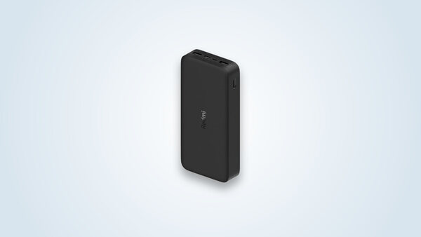 Black Redmi 20000mAh external battery, with two USB-A ports and one input port, Redmi logo visible on the edge