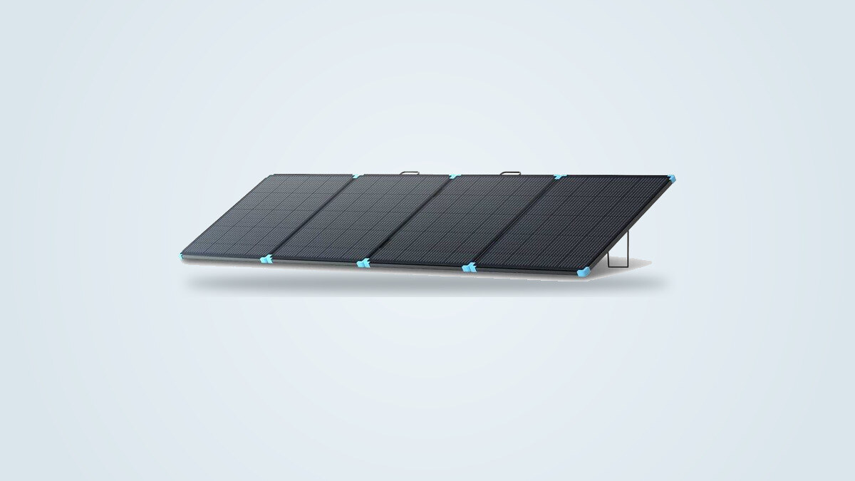 Renogy 400W Lightweight Solar Suitcase deployed on its adjustable kickstands, four monocrystalline panels visible from a three-quarter angle on a light gradient background