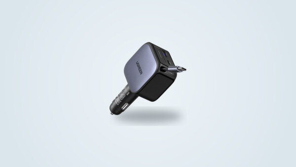 Ugreen 90W car charger seen from a three-quarter angle, retractable USB-C cable partly extended, with the USB-C and USB-A ports visible on the side