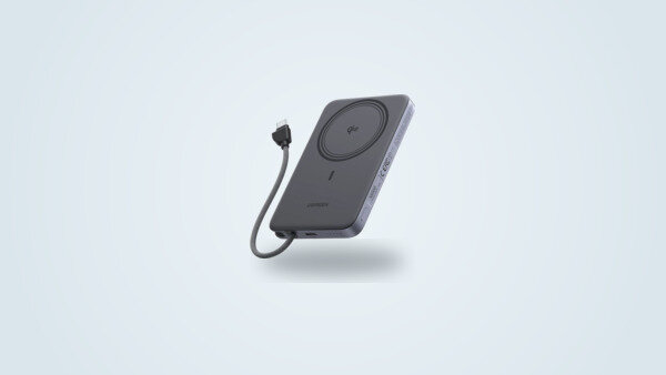 Grey Ugreen MagFlow Air 10000mAh magnetic power bank in three-quarter view: Qi2 ring on the back and the built-in braided USB-C cable pulled out in a loop that works as a lanyard