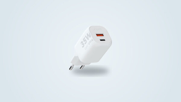 Xtorm GaN2 Ultra 35W wall charger seen from a three-quarter angle, white body with a USB-C port and a USB-A port visible, fixed European two-pin plug
